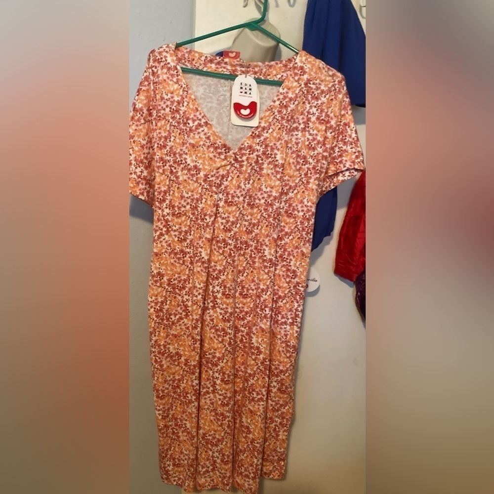 Nwt is labeled a maternity dress, but could be worn by anybody for any occasion.
